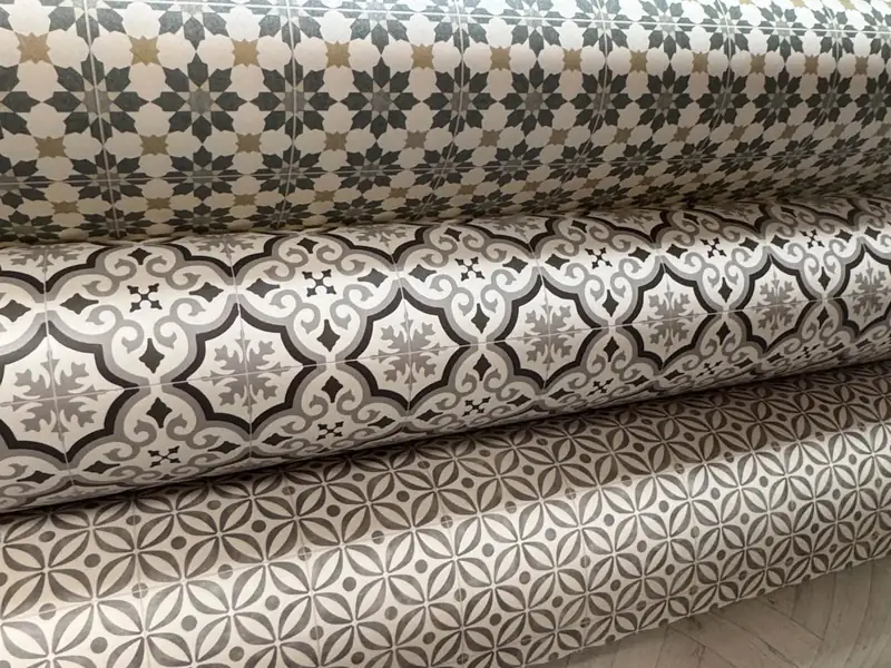 Tile-pattern vinyl rolls in a variety of colours at Farrells.